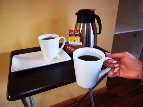 Cafe o te de cortesía